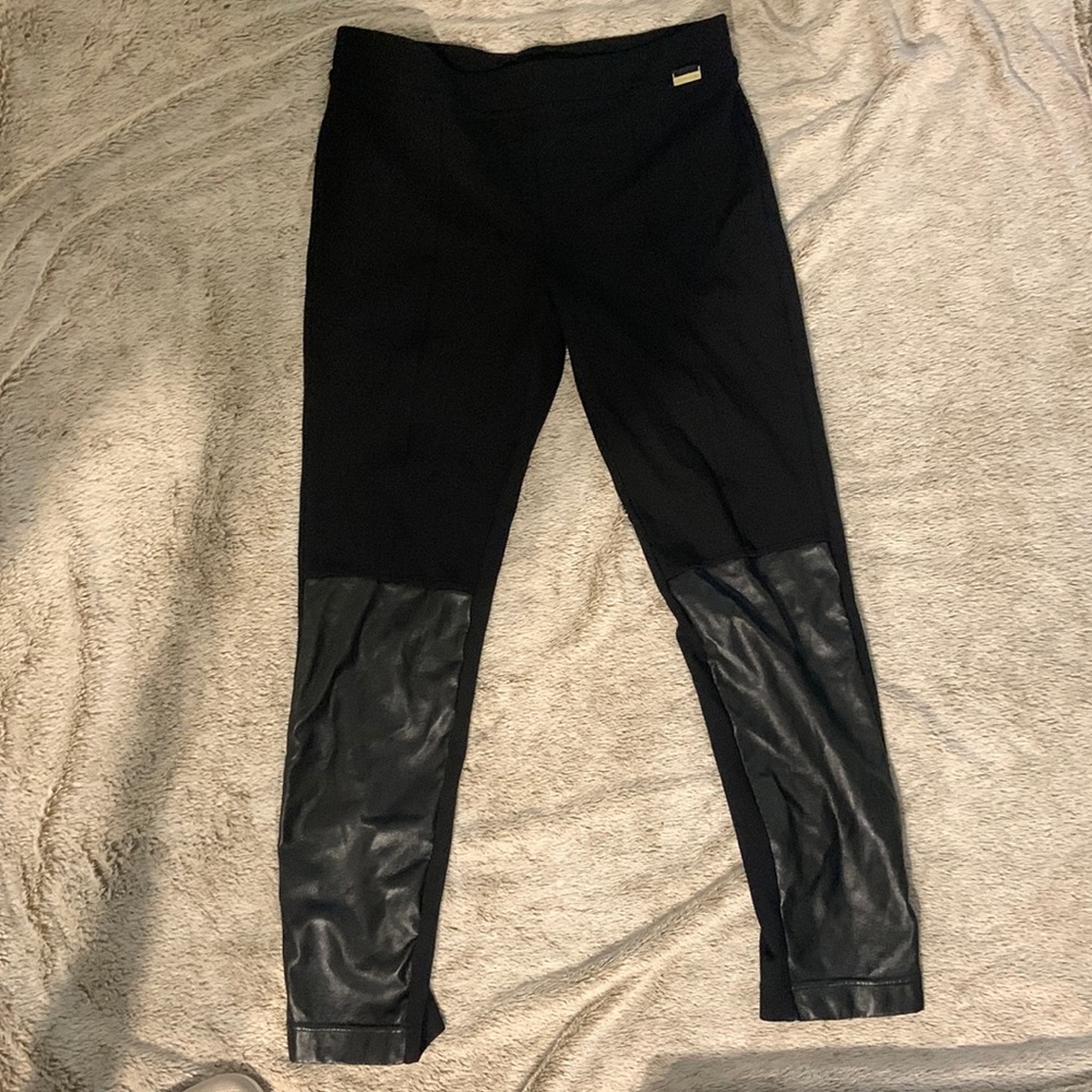 Calvin Klein black stretch pants pleather panels on the shins great condition